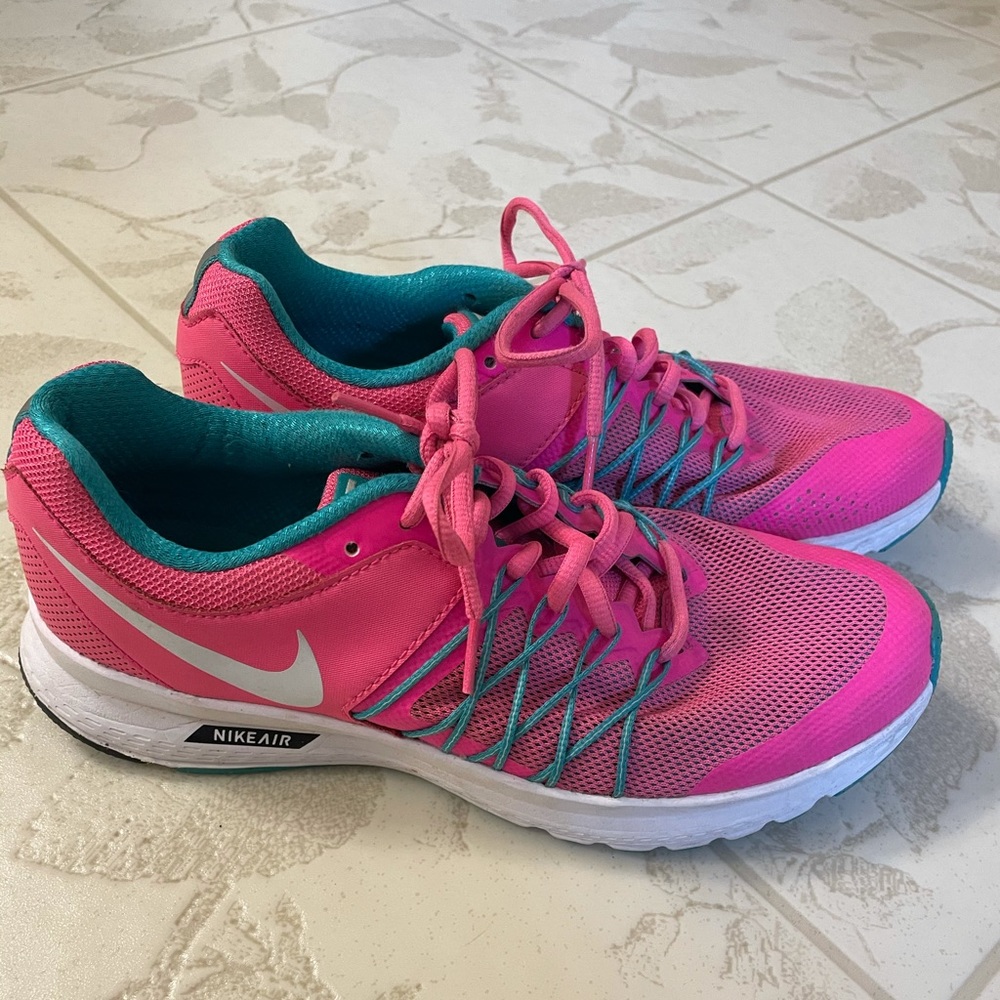 pink and teal nike tennis shoes
